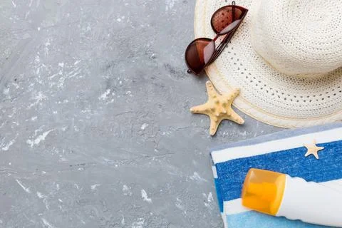 Summer vacation concept flat lay. beach accessories and towel top view. Space Stock Photos