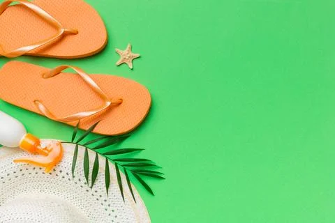 Summer vacation concept flat lay. straw hat beach accessories and towel top.. Stock Photos