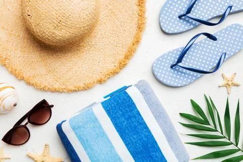 Summer vacation concept flat lay. beach accessories and towel top view. Spa.. Stock Photos