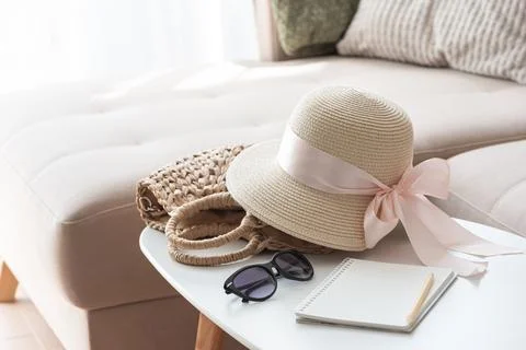 Summer vacation planning with a straw hat and sunglasses Stock Photos