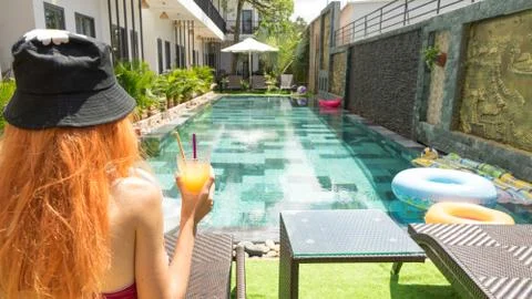 Summer vacation style red haired beautiful woman Stock Photos