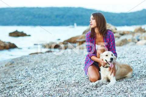 Summer Vacation, Woman With A Dog On A Walk On The Beach