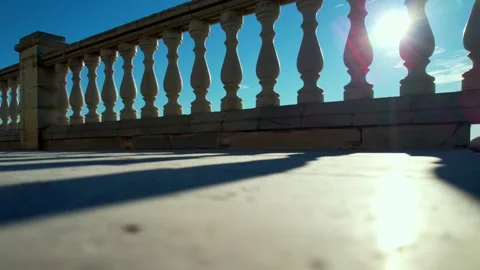 Summer view with classic white balustrade and empty terrace overlooking sea Video stock 238404270