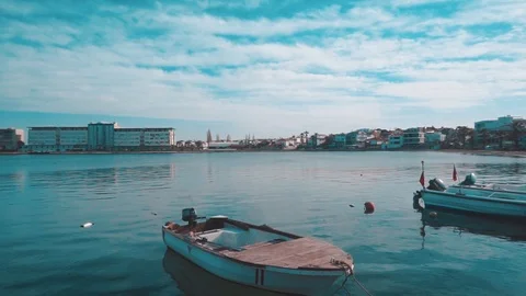 Summer view, concept of beach, sea, holiday. Sunny day, boats on sand in resort. Stock Footage 108628096