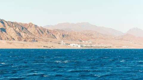 A summer view of the dahab coast featuring a crystal clear blue water bay, majes Stock Photos