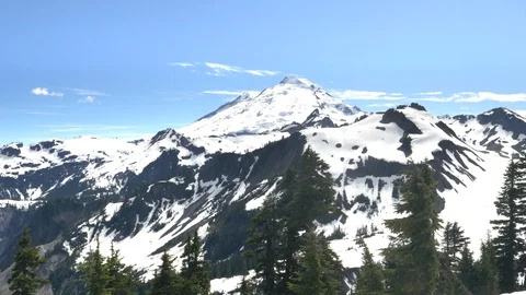 Summer view of snow covered mt baker in washington state Stock Footage 98479231