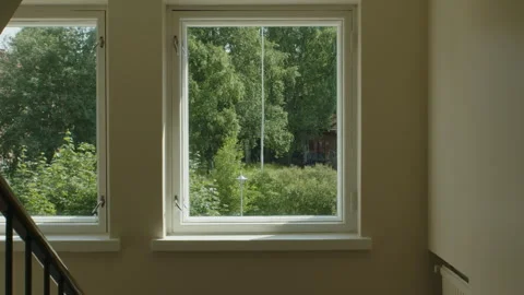 Summer view through staircase window with sunlight Video stock 312928600
