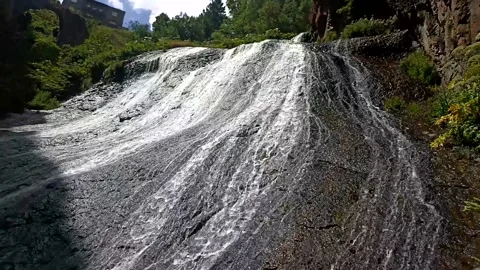 Summer water background, water drops, water reflection, waterfall in the nature Stock Footage 340503243