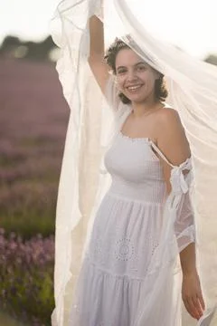 Summer wedding bride dress in Provence lavender field meadow. hispanic young Stock Photos