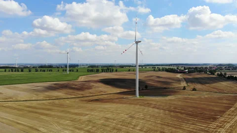 Summer. Wind power generators in the fields of Europe Stock Footage 101492553
