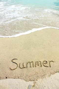 Summer words on sand Stock Photos