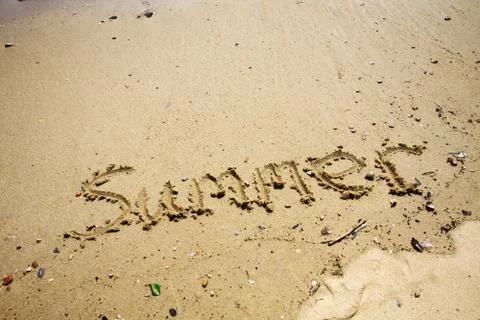 Summer words on sand Stock Photos