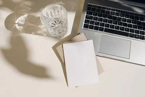 Summer workspace composition with open laptop. Greeting card, invitation mockup 写真素材
