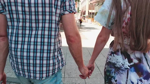 Summer. Young couple of lovers walking in the city Stock-Footage 239004703