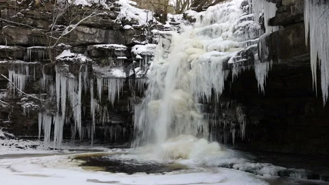 Summerhill Force and Gibson’s Cave in Winter, Teesdale, County Durham, UK Stock Footage 148551997