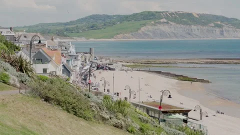 A summers day on Lyme Regis seafront, West Dorset, England, UK Video stock 312700810