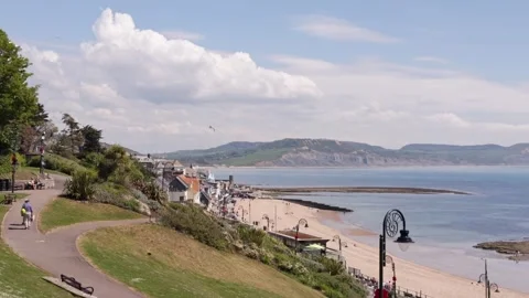 A summers day on Lyme Regis seafront, West Dorset, England, UK Stock Footage 314274688