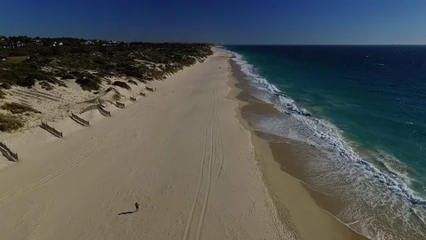 Summertime beach people waves sun sand holiday flyover tourism holiday footage Stock Footage 100072433