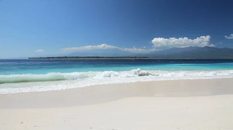 Summertime tropical island white sand beach Stock Footage