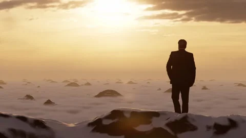 The summit is bathed in the dawn light, looking forward to the future. Video stock 313857889