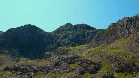 Summit Gaze: Upward View of Snowdon Mountain Peak Stock Footage 249975708