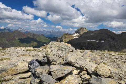 Summit name written on a rock in Pyrenees Stock Photos