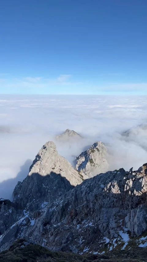 Summit view above clouds in Slovenia Stock Footage 335223111
