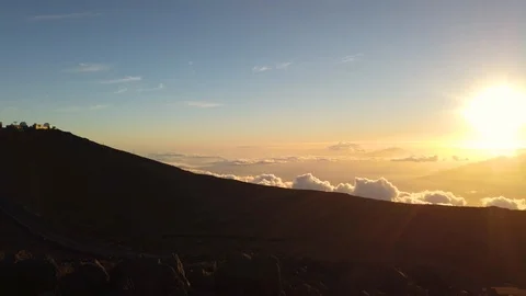 Summit view at sunset and lens flare at Haleakala Volcano Crater,Maui,Hawaii,USA Stock Footage 119657462