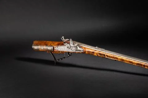 Sumptuous Ansbacher Steinschloss front-loader rifle, decorated with hunting.. Stock Photos