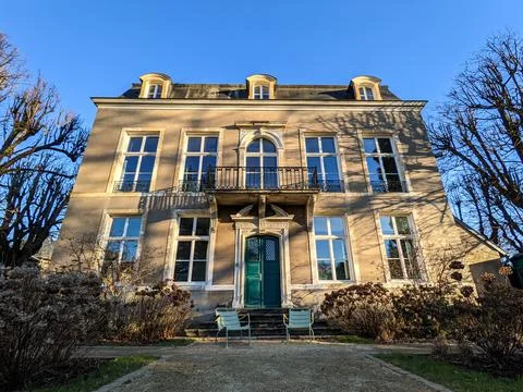 Sumptuous old property facade with light and shadow Stock Photos