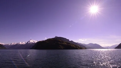 The sun is above the lake. Stock Footage 75368702