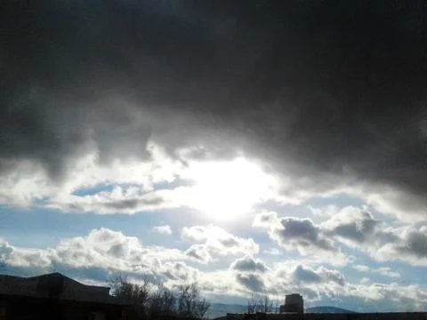 The sun against a stormy cloud Stock Photos