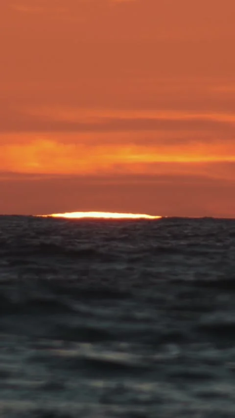 The sun almost set above the horizon of the sea Stock Footage 330157436