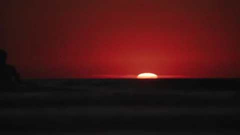 Sun almost under horizon Stockbeeldmateriaal 237758371