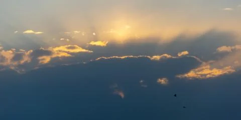 Sun and beautiful cloud in the blue sky at sunset time Stock Photos