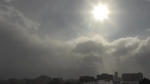 Sun and cloud mix as storm approaches city from the west Stock Footage 149545209