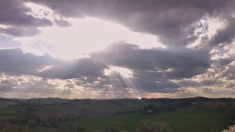 Sun and cloud in time lapse. country landscape with light trought moving cloud. Video stock 235007560