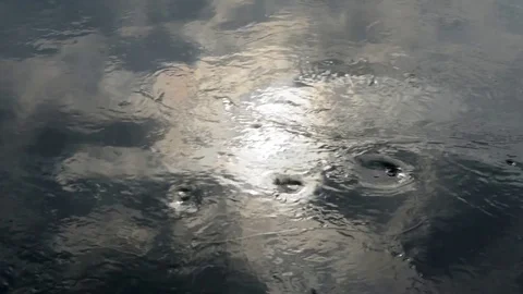 The sun and the clouds are reflected in the waters of the river on an autumn day Stock Footage 83898684