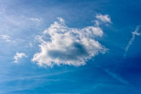 Sun and clouds in the blue sky 库存照片