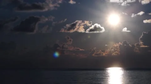 Sun and clouds from the deck of a ship in the ocean. boundless ocean Stock Footage 97813065