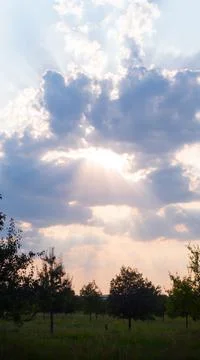 Sun and clouds with light leaks Stock Photos