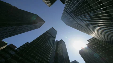 The Sun and Clouds Moving Above the Skyscrapers Stock Footage 327276923