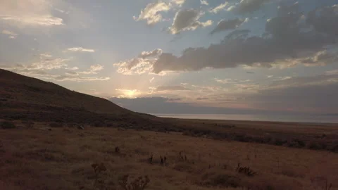 Sun and Clouds Over Feild UHD Stock Footage 176020836