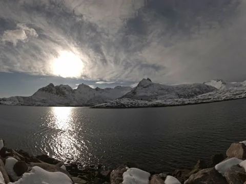 Sun and clouds over sea and snowy mountains in Norway Stock Footage 206050914