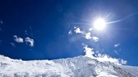 Sun and clouds racing over Nuptse from camp 2 Stock-Footage 122094514