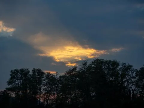 Sun and clouds before rain Stock Photos