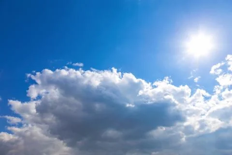 Sun and clouds on sky Stock Photos
