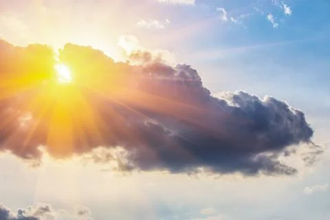 Sun and clouds on sky Stock Photos