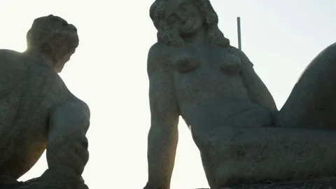 Sun and a Couple of Statues Stock Footage 78766927