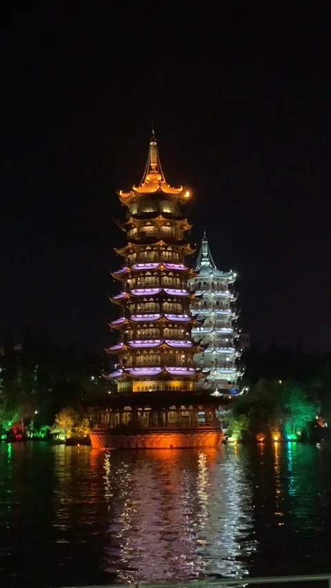 Sun and Moon pagodas by night in Guilin Stock Footage 341276398